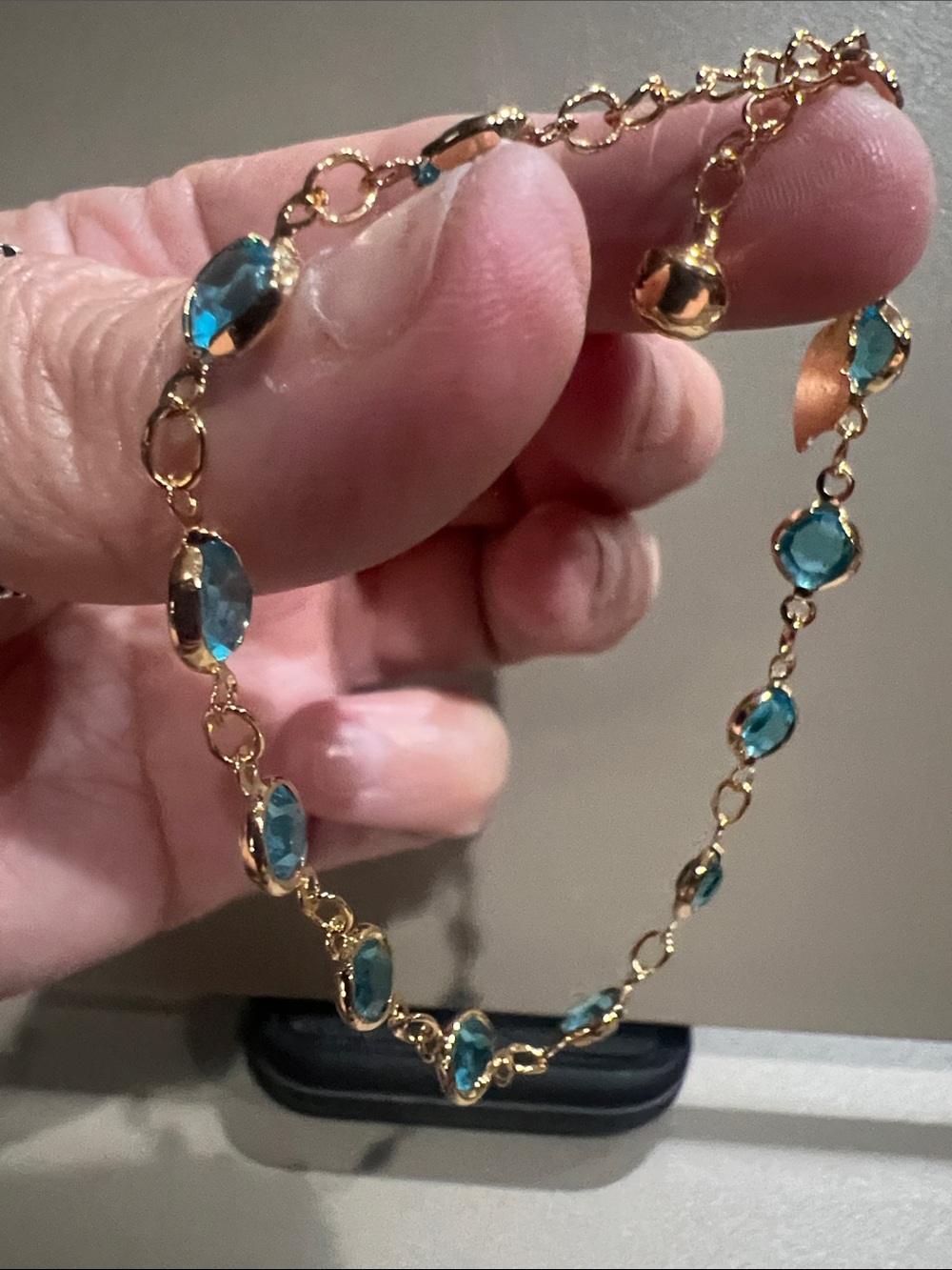 Gold Bracelet with Blue Gemstone Accents
